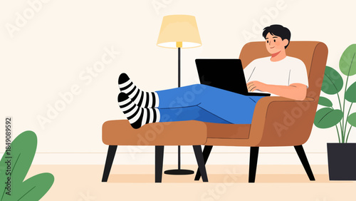Man relaxing with laptop on chair