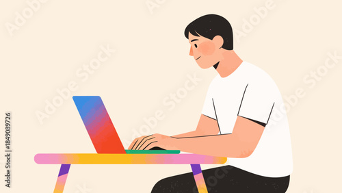 Person using laptop at colorful desk