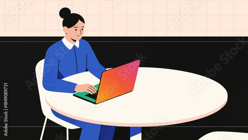 Person working on laptop at table