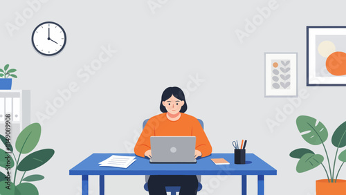 Person working on laptop at desk