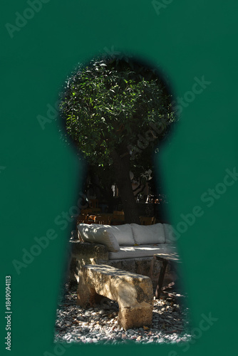 Secret Garden View with Seats through a Keyhole