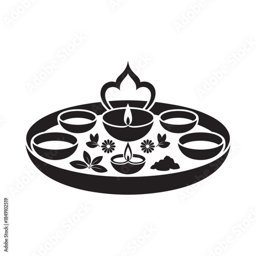 A decorative black and white illustration of a thali with oil lamps