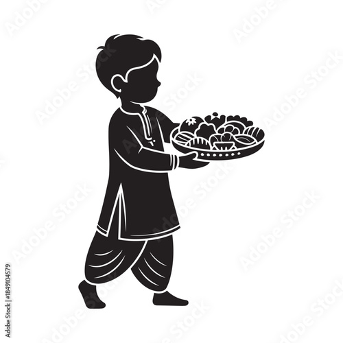 Silhouette of a boy carrying a tray filled with sweets and treats