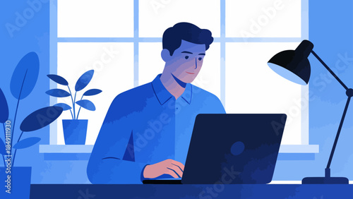 Man working on laptop at desk