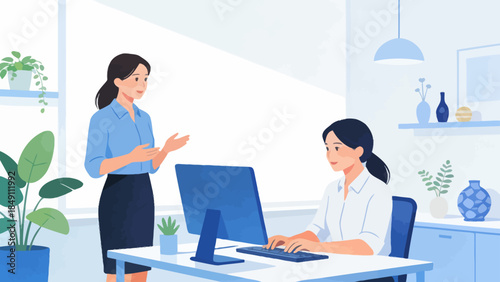 Office workers collaborating at desk