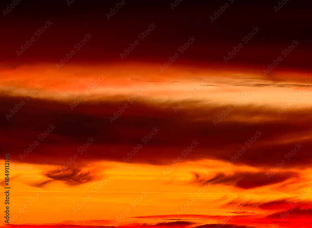 Fototapeta premium Sunset sky with dramatic swirling clouds and vibrant colors – ideal nature background for commercial design Abstract Orange Red Gradient