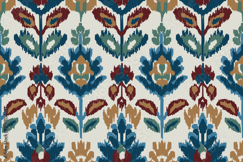 African boho paisley floral embroidery Ikat border pattern with ethnic Indian and Aztec influences. Seamless ethnic Ikat floral motifs featuring ornamental embroidery details, inspired by traditional 