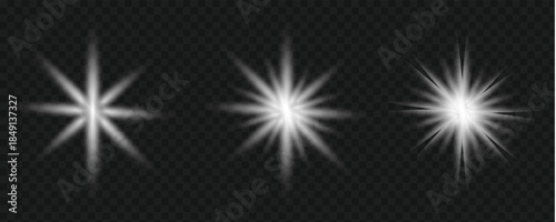 Three white starburst effects on black background