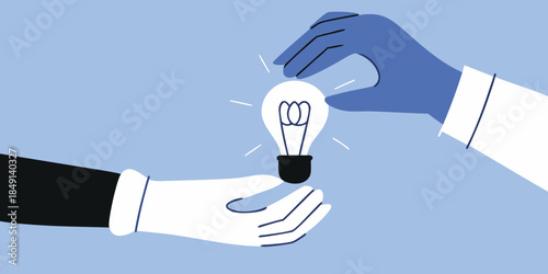 Hands exchanging a glowing light bulb representing idea sharing or innovation