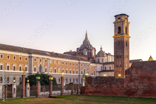 Turin, Italy. View from the Palatine Towers Archaeological Park showing the bell tower and dome of the Basilica of Turin, the Chapel of the Holy Shroud and the Museum of Antiquities at dusk.