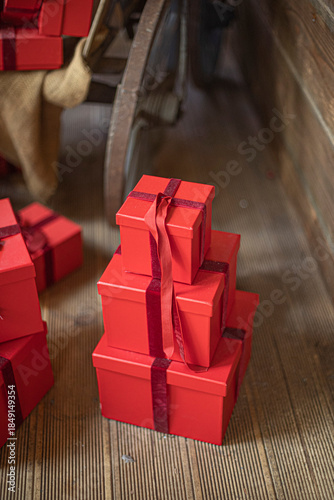 Gift boxes piled in a heap. Mountain of Christmas gifts close-up.