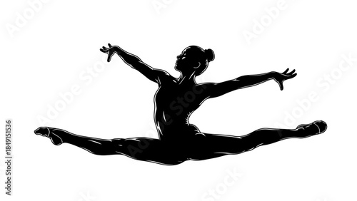 Elegant silhouette of a female ballet dancer in mid-jump performing a grand split showcasing grace