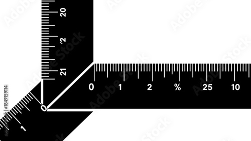 close-up view of a black and white geometric measuring scales intersecting with detailed markings
