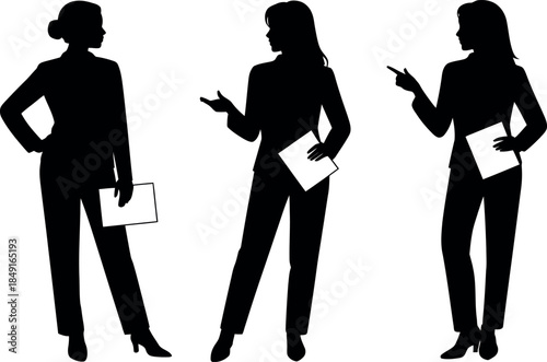silhouette of three business women standing with documents