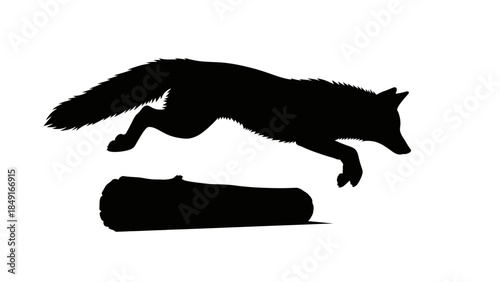 Silhouette of a fox prowling over a fallen log in a minimal monochrome scene