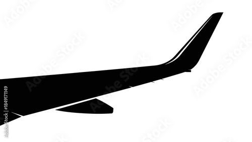 Silhouette of an airplane wing soaring through the sky with sleek design and aerodynamic features