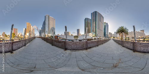 Tableau sur toile 360 hdri seamless panorama on pedestrian path with bridge near skyscrapers with
