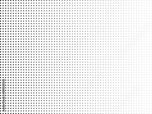 Perforated metal sheet with small holes in a grid pattern on a