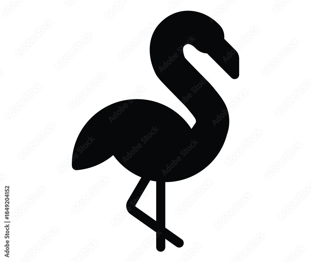 Obraz premium Elegant silhouette of a flamingo standing gracefully in profile view