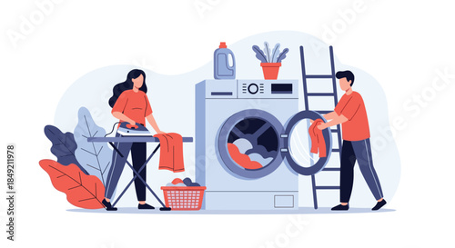 Couple doing household chores together in a laundry room with the man loading the washing machine and the woman ironing.