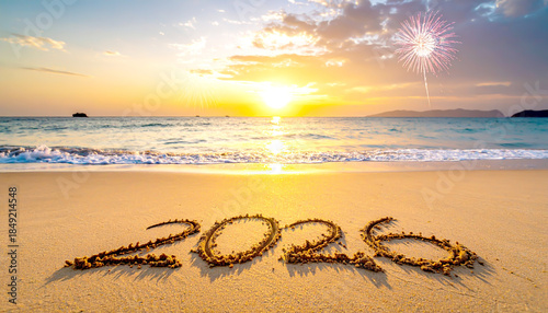 „2026“ im Sand am Strand be...