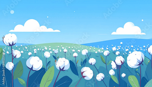 Field of white fluffy plants under a blue sky with clouds, green hills in background