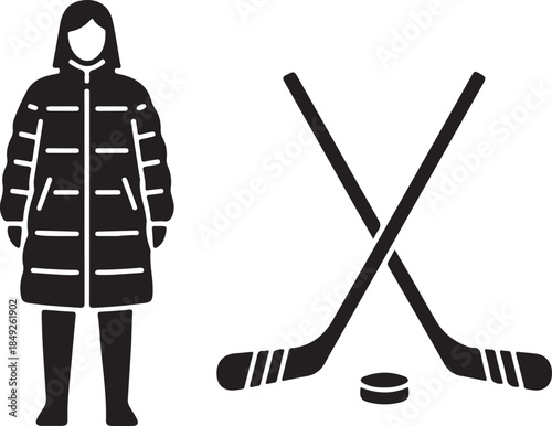 Winter sports and cold weather apparel concept featuring a figure in a warm puffer coat next to ice hockey sticks and puck.