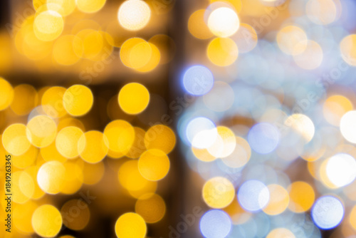 An abstract colorful background of warm-toned lights. In anticipation of Christmas and the holidays.