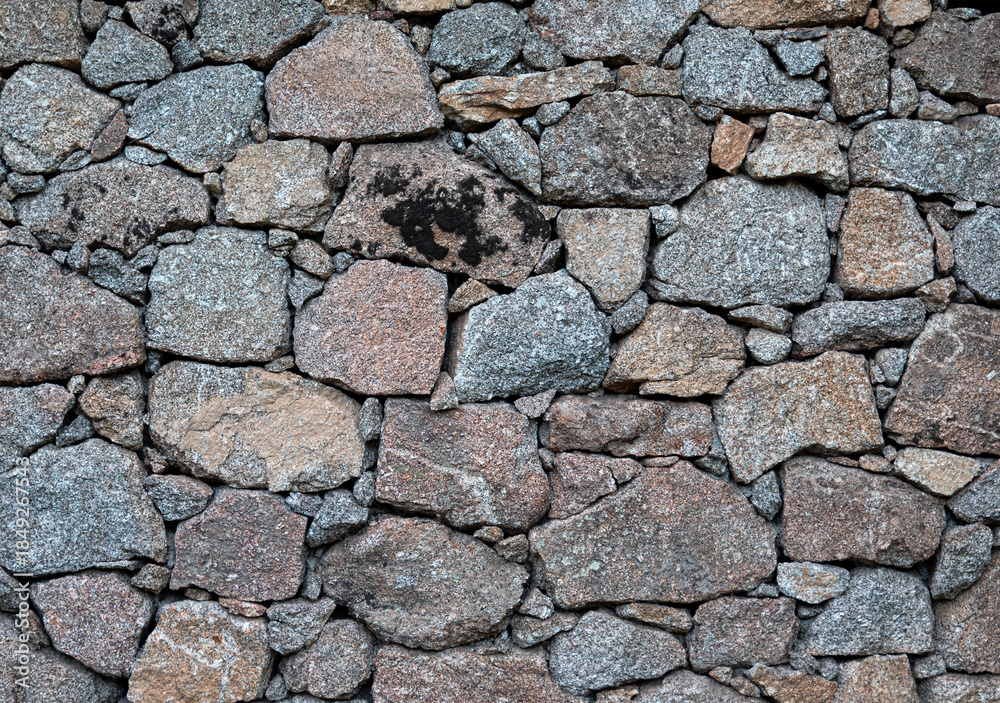 Obraz premium Rustic, old-fashioned stone wall background