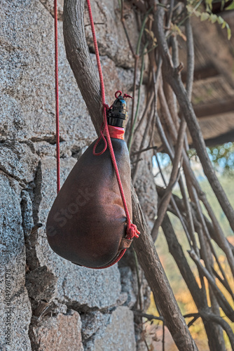 Photos Traditional leather wineskin in a rural setting
