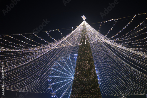 Defocused images of Christmas lights at a fair. 