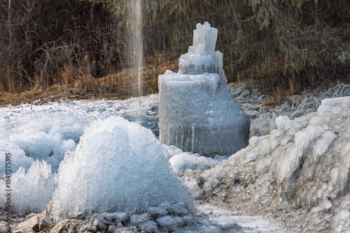 Wallpaper Mural Frozen water structures dominate the landscape, showcasing nature's artistry with intricate icicles. A winter wonderland is created by cold temperatures, shaping ice formations. Torontodigital.ca