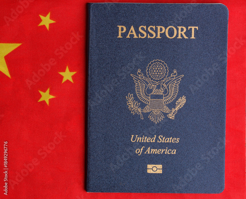 A US passport against the background of a Chinese flag