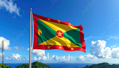 Grenada flag waving in the wind with beautiful landscape background