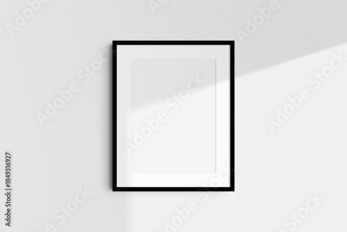 Frame mockup 4:5. Single black frame mockup. Clean, modern, minimalist, bright. Portrait. Vertical. Passepartout/mat opening in 3:4 aspect ratio. Shadow overlay.