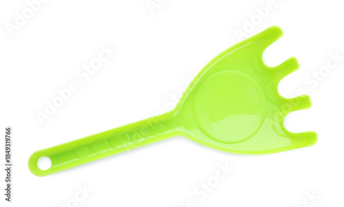 Photos Plastic rake isolated on white, top view. Children's beach toy