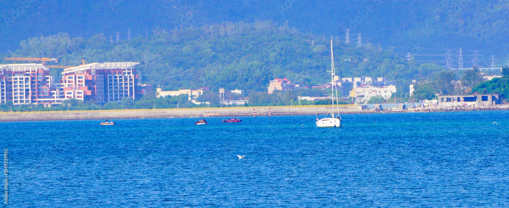 Obraz premium Sailboats on the ocean-shenzhen,china