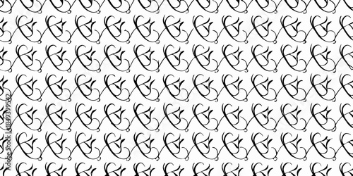 A dense repeating pattern of stylized black swirls and loops