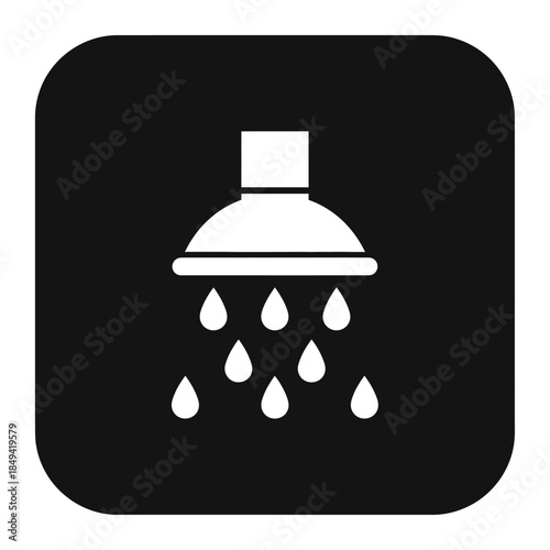 Water droplets falling from a shower head in a sleek, modern bathroom setting