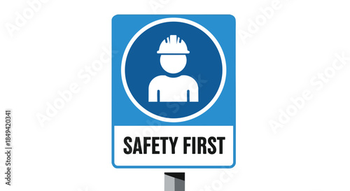 Essential workplace safety directive displayed prominently, indicating mandatory head protection measures required for personnel