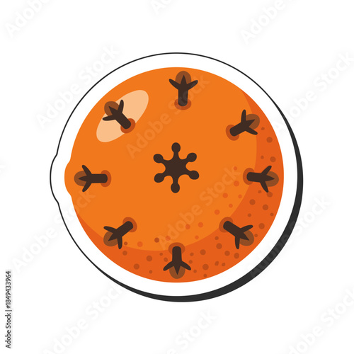 Overhead view of an orange pomander with cloves, a traditional holiday decoration.