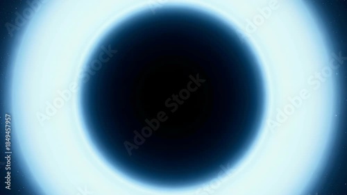 A striking visual representation of a black hole surrounded by a luminous blue accretion disk against a backdrop of twinkling distant stars