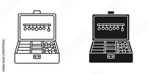 Open black and white toolboxes with hanging keys and compartments