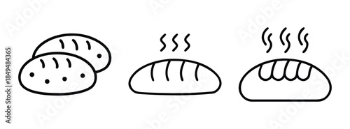 Freshly Baked Loaves of Bread, Various Types and Textures on Display