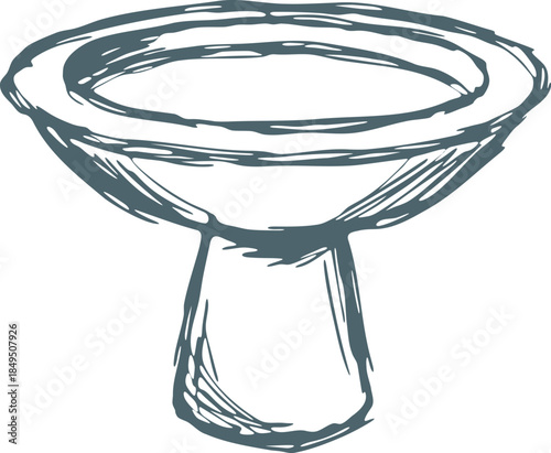 Stone birdbath on pedestal