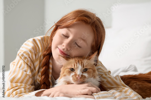 Redhead teenage girl with c...
