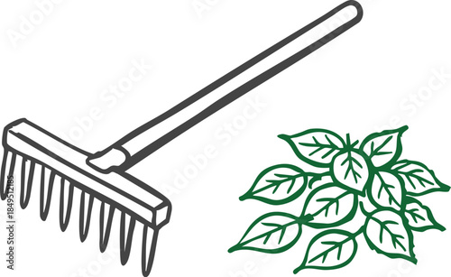 Garden rake with fresh leaves