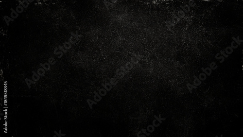 Closeup view of fine textured dark grey surface with subtle patterns