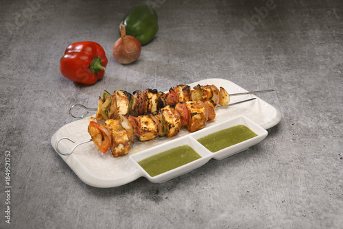 Paneer Tikka on a white platter