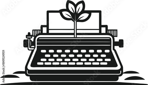 Vintage typewriter with a plant growing from the paper